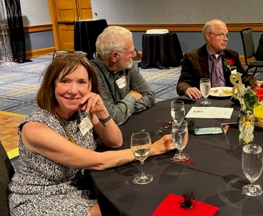 A lighter moment at the same table- Lisa Gerould, Rich Gerould, Dan Jones