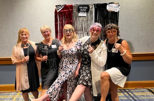 Some people just need to be in one more- even sillier- group shot!  We all had as good of a time- we just aren't all good at high kicks!